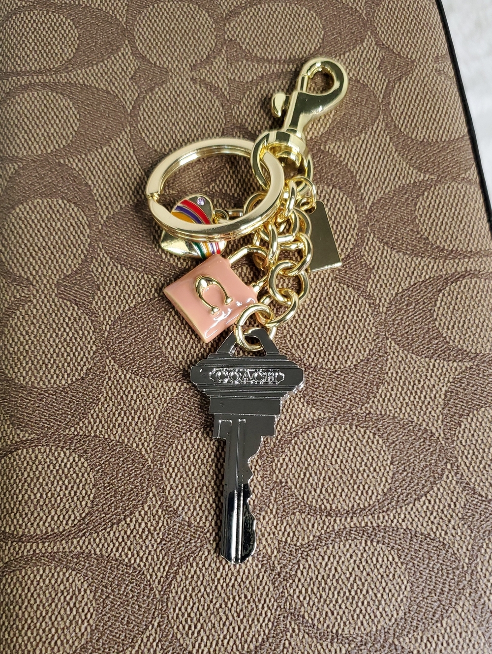 Gold-Tone Key Charm with Pink Enamel and Multicolor Accent